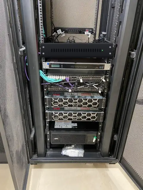 One secured cabinet holds the core switching, servers and UPS power that keep the hospital running.