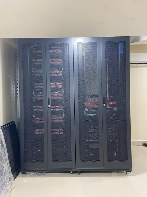 Finished server cabinets: locked, ventilated and tidy, so only authorised staff can reach the equipment.